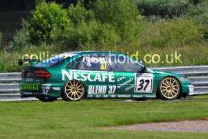 Race 1 saw the podium completed by Simon Garrad's Renault Laguna